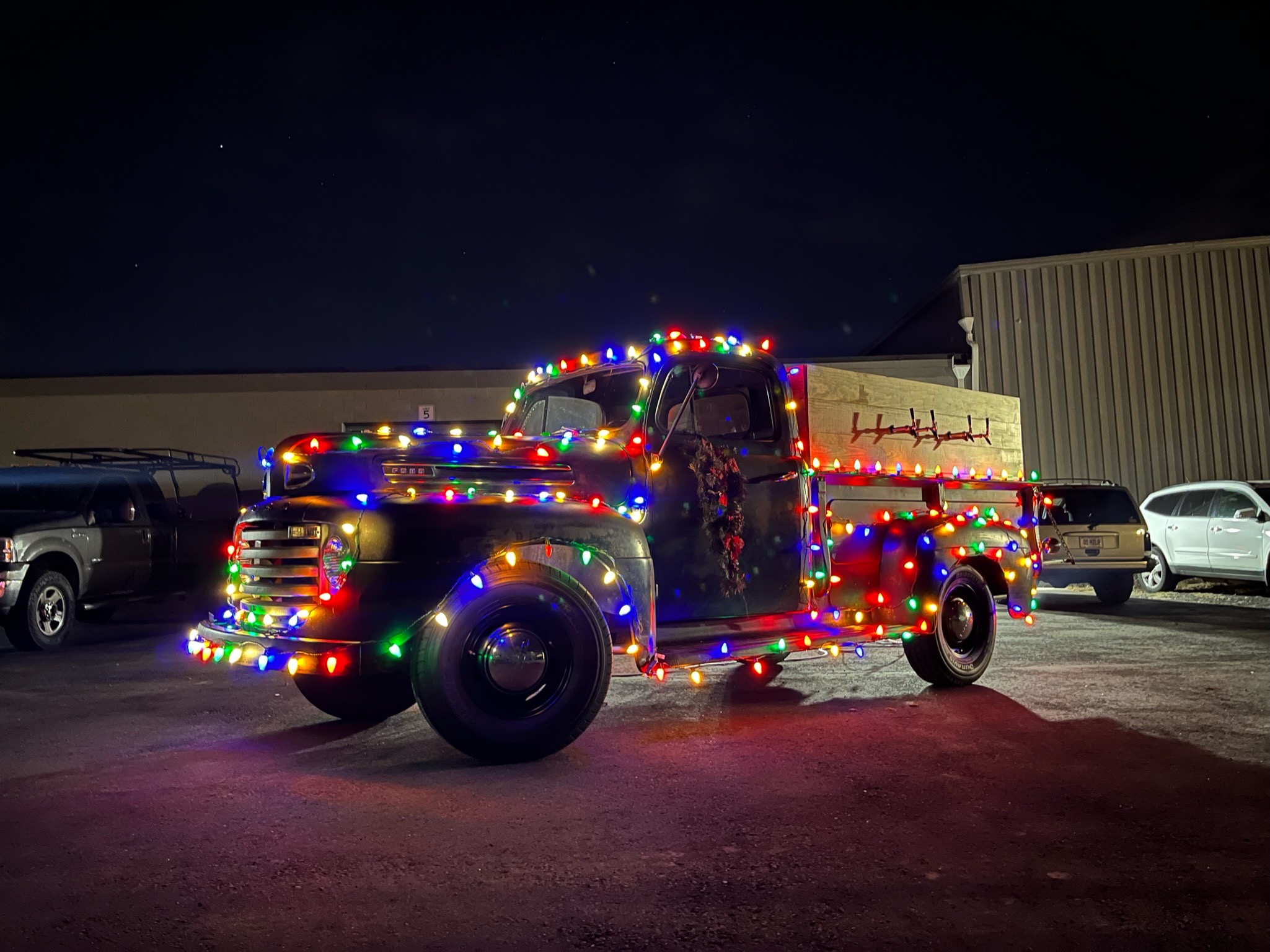 Classic Pour vintage tap truck lit up at night