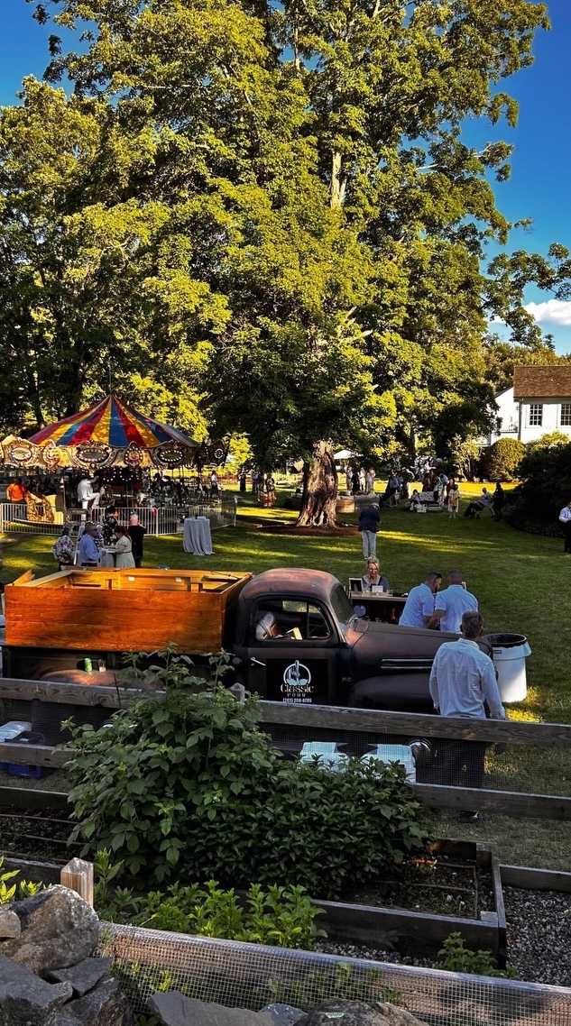 Classic Pour vintage mobile bar truck at an outdoor event